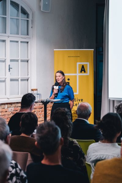 Begrüßung Eva-Maria Brunnauer, Vorsitzende der Initiative Architektur